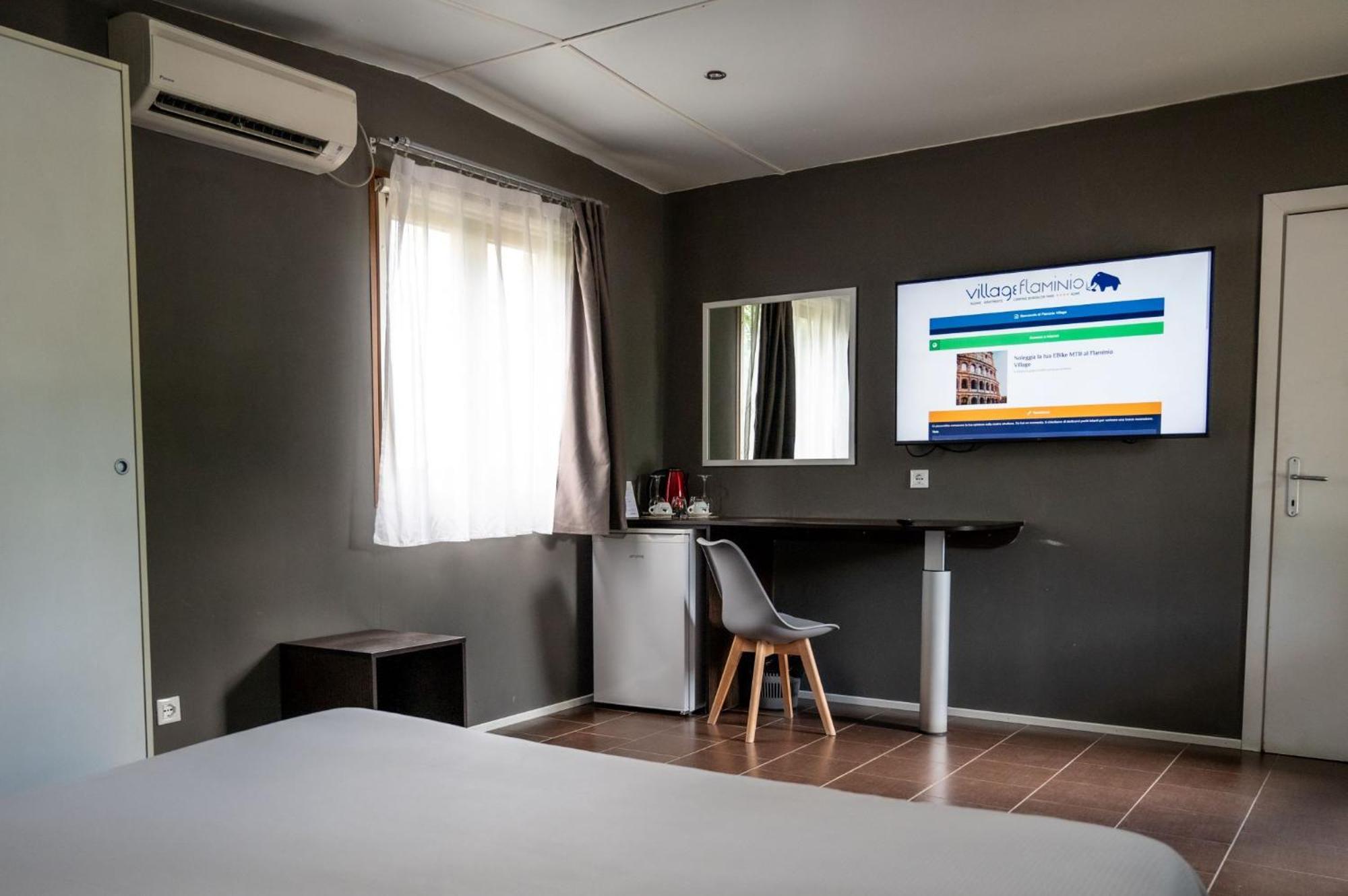 Camping Flaminio Village Park 4*